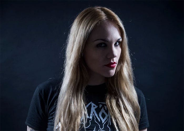 Prika Amaral, guitarist and vocalist of Nervosa, performing live